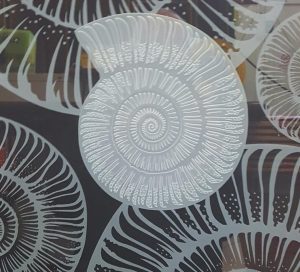 shell stencil in glass