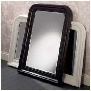 white and black framed mirrors
