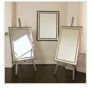 3 mirrors on easels