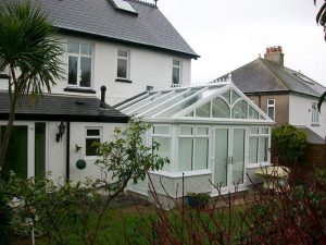 house and glass conservatory