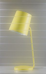 striped glass and yellow lamp