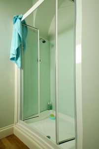 aqua walled bathroom shower