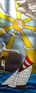 sailing boat and sun stained glass
